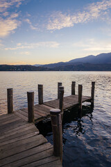 Wooden pier on lake Orta, Piedmont, Italy