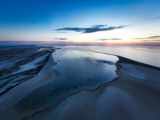 Unusual islands on a brilliant lake and colorful sunset