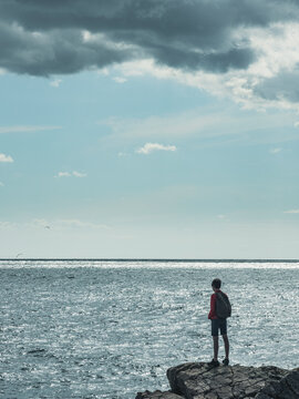 Silhouette of person at sea