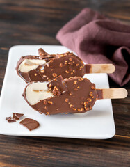 Chocolate-covered vanilla ice cream bar