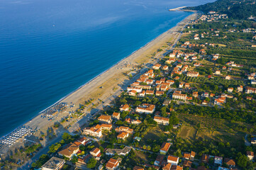 Fototapeta premium Agiokampos city aerial view and beach on Kato Sotiritsa, Greece