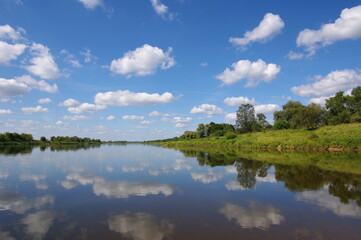 Obraz na płótnie Canvas clouds over the river