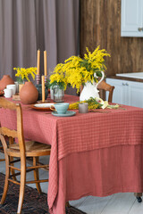 March 8 is international women's day. Mimosas. The interior of the apartment is decorated for the holiday. Postcard.