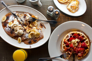Pancakes. Homemade Pancakes with crispy maple Bacon, butter and maple syrup. Classic American breakfast or brunch favorite. Made from scratch Cakes with bacon, butter and maple syrup.