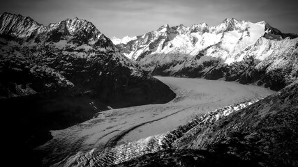 Aerial view over the largest glacier in Europe - the Aletschgletscher in the Swiss Alps - drone footage