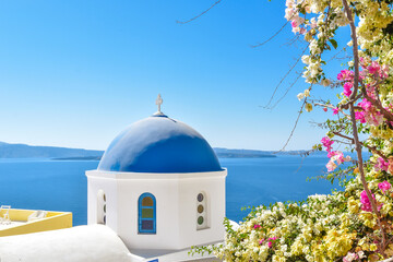 traditional greek church over the blue sea of ​​the aegean sea