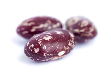 Close-up pinto beans isolated on white background