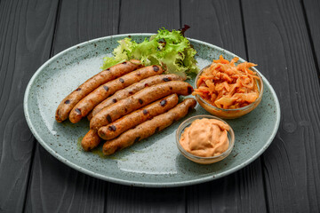 Bavarian fried sausages on sauerkraut