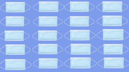 Many medical masks to protect against viruses and bacteria on a blue background. Epidemic concept. Regular pattern. View from above. copy space