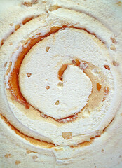Artistic Pattern and Texture of Salted Caramel Macadamia Nut Ice Cream for Background or Banner