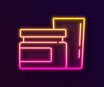 Glowing neon line Baby food icon isolated on black background.  Vector.