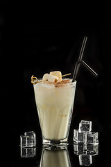 Alcoholic cocktail on black background