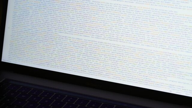 Front end web develop. Css and Html code in laptop screen. Web design concept.