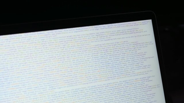 Front end web develop. Css and Html code in laptop screen. Web design concept.