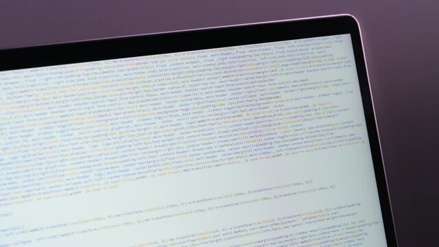 Front end web develop. Css and Html code in laptop screen. Web design concept.