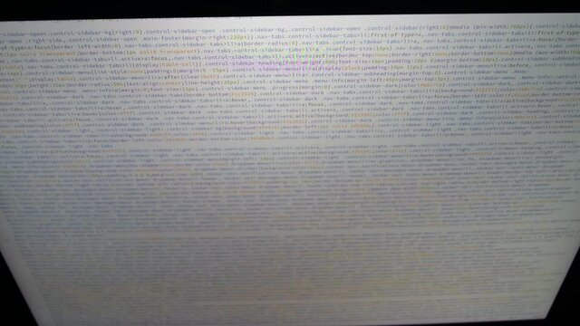 Front end web develop. Css and Html code in laptop screen. Web design concept.