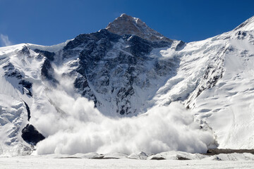 Huge avalanche from Khan Tengri peak (7010 m), Central Tian Shan, Kazakhstan. - obrazy, fototapety, plakaty