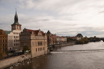 Panorama of the Vltava river. Roll on the river. Buildings along the river.