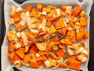 Baked carrot squash with onion and rosemary