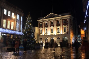 Christmastime at St Helen's Square, York, with the Mansion House in the background.