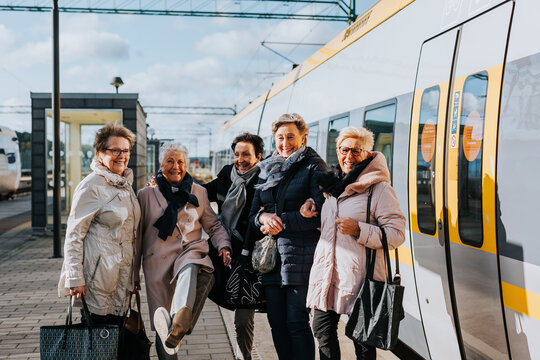 Women on train station platform