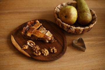 Piece Of  Apple Pie On Wooden Table