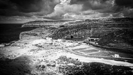 Flight over Dwerja Bay at the coast of Gozo Malta - aerial photography