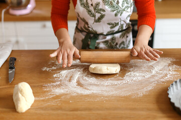 Woman Cooking Pie In The Kitchen
