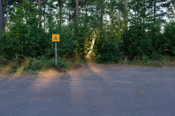 an empty parking lot out in the wilderness