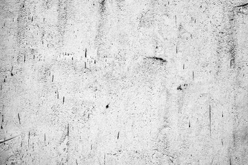 Texture of a concrete wall with cracks and scratches which can be used as a background