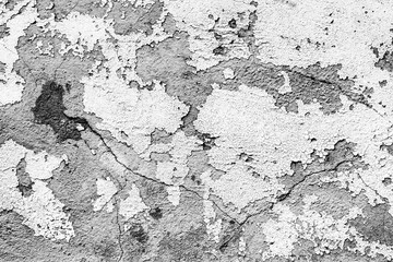 Texture of a concrete wall with cracks and scratches which can be used as a background