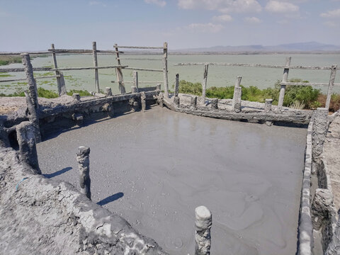 mud pool of volcano totumo close to Cartagena in the tropics of Colombia, is used as a wellness spa treatment by many tourists traveling through south america
