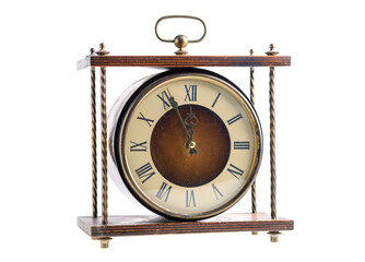 Vintage table clock with round dial isolated on white background