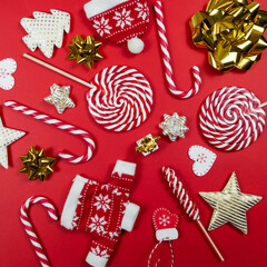 Christmas sweets composition. Christmas red striped candy canes and lollipops. Merry Christmas sweets and Happy New Year concept. Flatlay, copy space