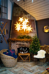 country house with fireplace and Christmas tree decorated for the holidays.