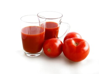 red tomatoes and juice as tasty vegetarian food