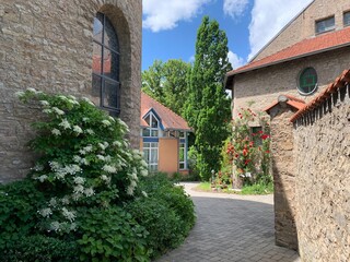 Fototapeta na wymiar typical European German courtyard and paving stones on a Sunny summer day
