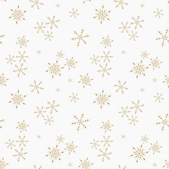 Golden vector snowflakes seamless pattern. Elegant Christmas and New Year background texture with gold snow, small snowflakes, sparkles on white. Winter holidays theme. Luxury repeat design for decor