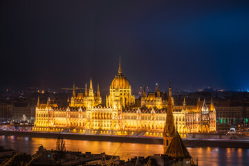 Fototapeta na wymiar Illuminated Hungarian Parliament dome viewed at night in Budapest, Hungary
