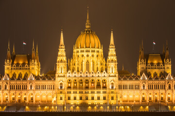 Fototapeta na wymiar Illuminated Dome of Hungarian Parliament building in Budapest. Hungary 