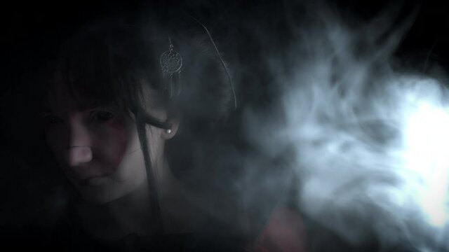 4k Black Background of Geisha Woman Posing with Black Eyes
