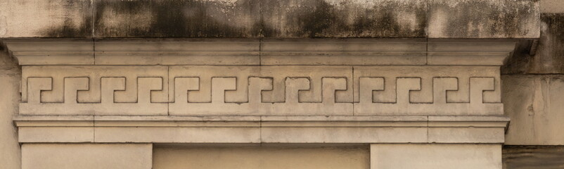 Elements of architectural decorations of buildings, gypsum stucco, wall texture, plaster molding and patterns. On the streets in Catalonia, public places. © Kozlik_mozlik