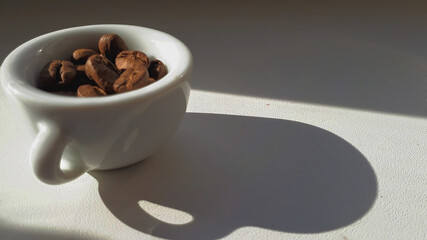 cup of coffee with beans