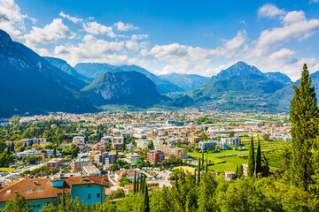 Aerial view at the popular touristic landmark Riva del Garda village at lake Garda, Italy. on a beautiful summer day