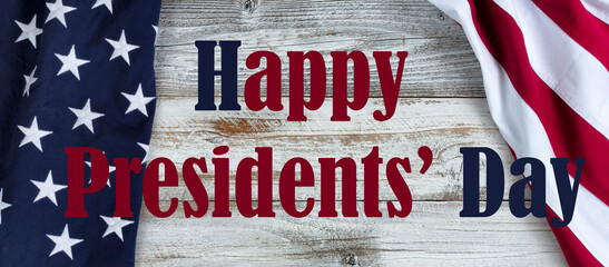 Fototapeta na wymiar Happy Presidents Day text with cloth US flag on side borders of white rustic wood