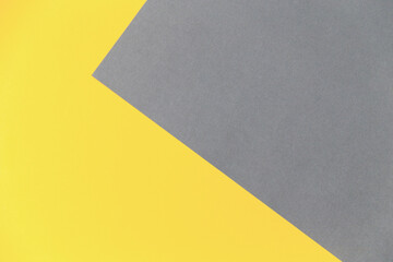 Color of the 2021 year 17-5104 Ultimate Gray and 13-0647 Illuminating. Abstract yellow and grey empty geometric background in 2021 color trends.