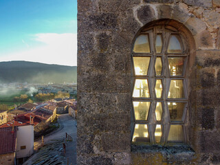 Church of San Adrian martir from drone view in the town of Regumiel de la Sierra in Burgos, Spain.