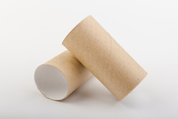empty paper toilet rolls on white background