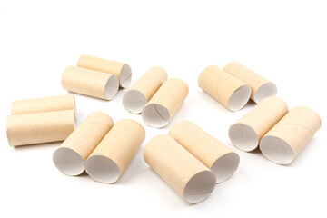empty paper toilet rolls on white background