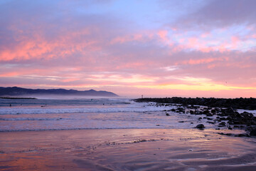 Sunset surf warning, mega waves, beautiful sky, pure power. 